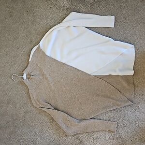 Criss cross dolman sleeve sweater.
